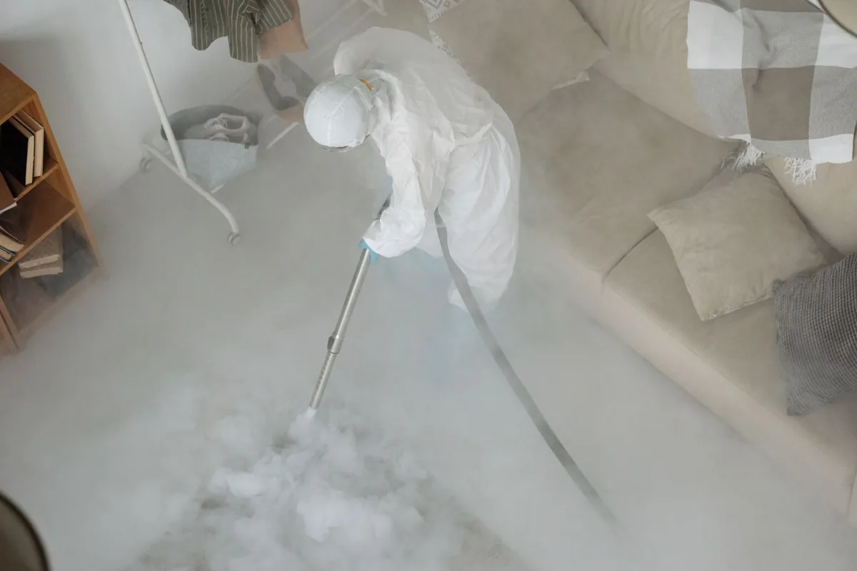 Biohazard cleanup technician in protective equipment, Descanso, CA